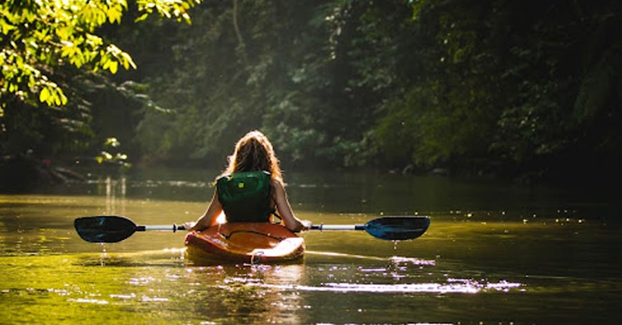 woman boating in a river